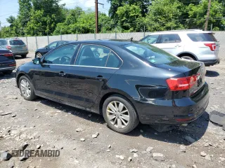 2015 Volkswagen Jetta SE with VIN 3VWD17AJ4FM329172, listed as a Copart auction lot 64143375 with 102,634 mi miles and Clean title. Bid and sale history available at DreamBid. Image 2.