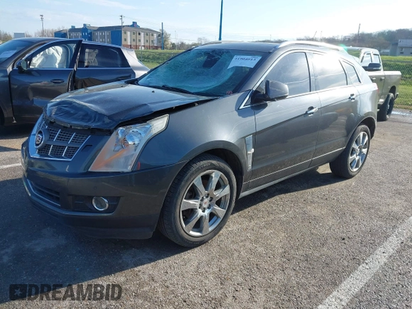 2011 Cadillac SRX Performance Collection with VIN 3GYFNBEYXBS527765, listed as a IAAI auction lot 41904013 with 168,318 mi miles and . Bid and sale history available at carsss.com. Image 2.