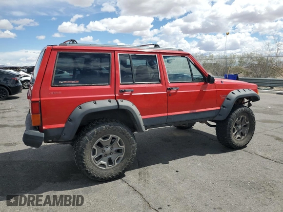 1996 Jeep Cherokee Sport with VIN 1J4FJ68S6TL213886, listed as a Copart auction lot 51462275 with 215,091 mi miles and Salvage title. Bid and sale history available at DreamBid. Image 3.