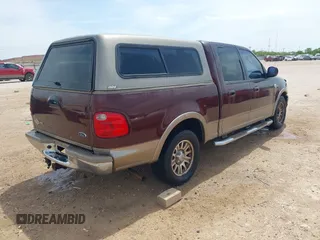 2003 Ford F-150 XLT with VIN 1FTRW07LX3KC09941, listed as a IAAI auction lot 42035068 with 137,762 mi miles. Bid and sale history available at carsss.com. Image 4.