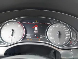 2016 Audi S6 Prestige z VIN WAUH2AFC1GN016187, wystawiony jako IAAI lot #42274744 z przebiegiem 169 821 mil mil oraz . Historia ofert i sprzedaży dostępna na DreamBid. Obrazek 7.