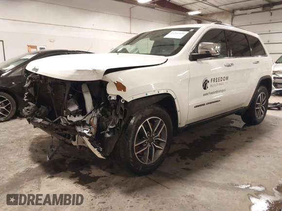 2021 Jeep Grand Cherokee 80th Anniversary with VIN 1C4RJFBG6MC569585, listed as a IAAI auction lot 41341608 with 73,234 mi miles and . Bid and sale history available at DreamBid. Image 22.