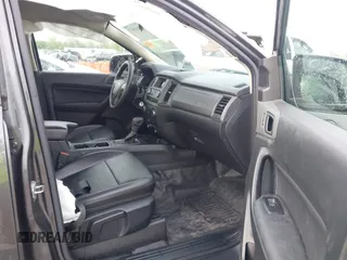 2019 Ford Ranger XL z VIN 1FTER4FH7KLB21674, wystawiony jako IAAI lot #42115937 z przebiegiem 43 912 mil mil oraz . Historia ofert i sprzedaży dostępna na DreamBid. Obrazek 5.