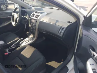 2013 Toyota Corolla L z VIN 5YFBU4EE9DP194743, wystawiony jako IAAI lot #41778458 z przebiegiem 148 767 mil mil oraz . Historia ofert i sprzedaży dostępna na DreamBid. Obrazek 5.