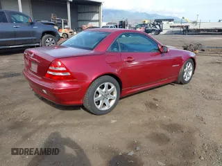 2001 Mercedes-Benz SLK-Class Kompressor with VIN WDBKK49F51F203464, listed as a IAAI auction lot 41807410 with 114,822 mi miles. Bid and sale history available at carsss.com. Image 4.