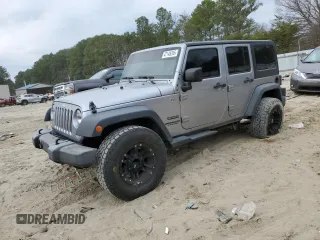 2015 Jeep Wrangler Unlimited Willys Wheeler with VIN 1C4BJWDG4FL723924, listed as a Copart auction lot 47145245 with 166,256 mi miles and Salvage Title. Bid and sale history available at DreamBid. Image 1.
