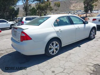 2012 Ford Fusion SE z VIN 3FAHP0HG1CR439198, wystawiony jako IAAI lot #42272610 z przebiegiem 151 249 mil mil oraz . Historia ofert i sprzedaży dostępna na DreamBid. Obrazek 4.