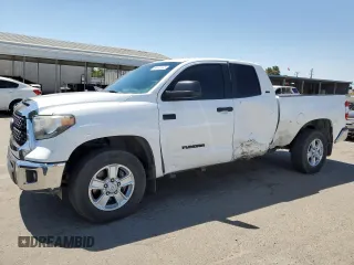 2020 Toyota Tundra SR with VIN 5TFUY5F1XLX931611, listed as a Copart auction lot 64440445 with 127,562 mi miles and Salvage title. Bid and sale history available at DreamBid. Image 1.