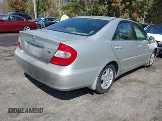 2003 Toyota Camry LE z VIN 4T1BF32K93U053750, wystawiony jako IAAI lot #41930830 z przebiegiem Nie podano mil oraz . Historia ofert i sprzedaży dostępna na DreamBid. Obrazek 4.