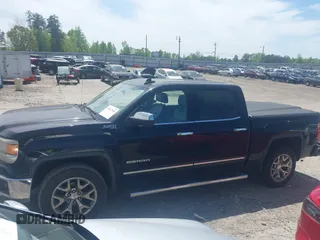 2015 GMC Sierra 1500 SLT with VIN 3GTU2VEC5FG200727, listed as a IAAI auction lot 42017160 with 191,201 mi miles and . Bid and sale history available at DreamBid. Image 14.