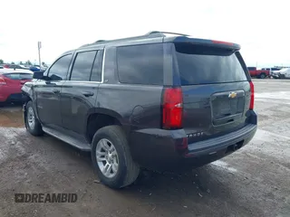 2015 Chevrolet Tahoe LT with VIN 1GNSCBKC2FR632173, listed as a IAAI auction lot 42135105 with 150,033 mi miles and . Bid and sale history available at DreamBid. Image 3.
