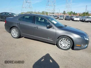 2011 Ford Fusion Hybrid with VIN 3FADP0L34BR290335, listed as a IAAI auction lot 42094674 with 171,391 mi miles. Bid and sale history available at carsss.com. Image 1.