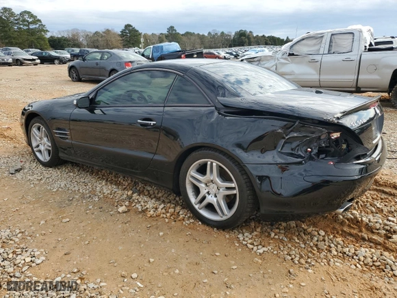 2007 Mercedes-Benz SL-Class 5.5L V8 with VIN WDBSK71F57F130540, listed as a Copart auction lot 43042515 with 82,744 mi miles and Salvage Title. Bid and sale history available at carsss.com. Image 2.