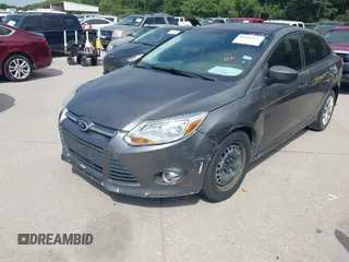 2012 Ford Focus SE z VIN 1FAHP3F24CL294391, wystawiony jako IAAI lot #42545359 z przebiegiem 190 904 mil mil oraz . Historia ofert i sprzedaży dostępna na DreamBid. Obrazek 6.