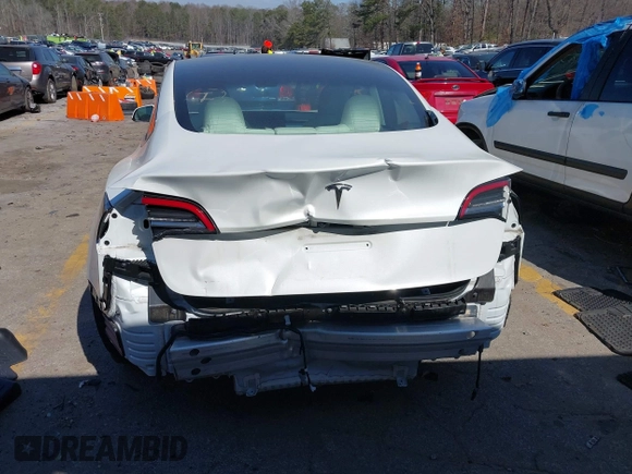 2022 Tesla Model 3 with VIN 5YJ3E1EA7NF103513, listed as a IAAI auction lot 41643592 with 35,631 mi miles and . Bid and sale history available at DreamBid. Image 21.