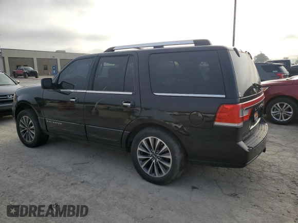 2015 Lincoln Navigator with VIN 5LMJJ2HT5FEJ04502, listed as a Copart auction lot 65600565 with 121,383 mi miles and Clean title. Bid and sale history available at DreamBid. Image 2.