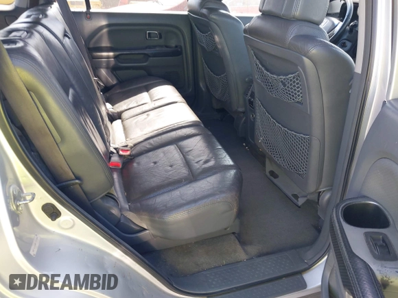 2005 Honda Pilot EX-L z VIN 2HKYF18695H545804, wystawiony jako IAAI lot #42354721 z przebiegiem 228 914 mil mil oraz . Historia ofert i sprzedaży dostępna na DreamBid. Obrazek 8.
