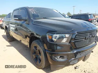 2021 Ram 1500 Big Horn z VIN 1C6RREFT1MN769814, wystawiony jako IAAI lot #42052424 z przebiegiem 71 958 mil mil oraz . Historia ofert i sprzedaży dostępna na DreamBid. Obrazek 1.