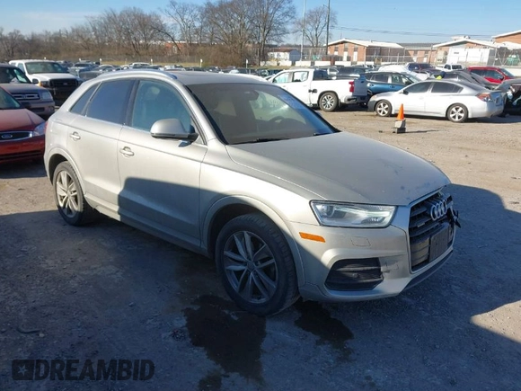 2017 Audi Q3 Premium Plus z VIN WA1JCCFS5HR011907, wystawiony jako IAAI lot #41675496 z przebiegiem 102 591 mil mil oraz . Historia ofert i sprzedaży dostępna na DreamBid. Obrazek 1.