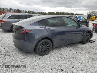 2025 Tesla Model Y Long Range with VIN 7SAYGDED9SA341967, listed as a Copart auction lot 47368695 with 4,310 mi miles and Salvage Title. Bid and sale history available at DreamBid. Image 3.