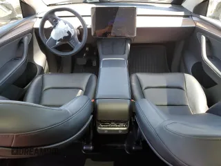 2024 Tesla Model Y Long Range with VIN 7SAYGAEE9RF125458, listed as a Copart auction lot 59567365 with 28,966 mi miles and Salvage title. Bid and sale history available at DreamBid. Image 8.