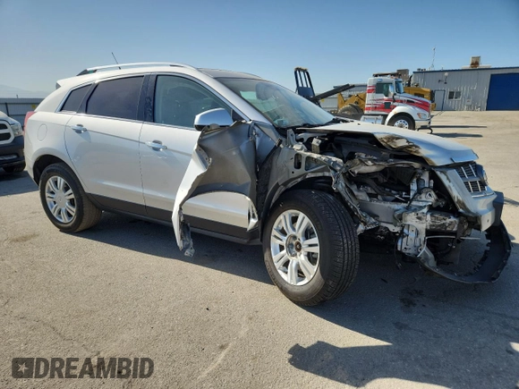 2012 Cadillac SRX Luxury Collection z VIN 3GYFNAE3XCS622942, wystawiony jako Copart lot #58845175 z przebiegiem 147 718 mil mil oraz Nie do naprawy • Non repairable. Historia ofert i sprzedaży dostępna na DreamBid. Obrazek 4.