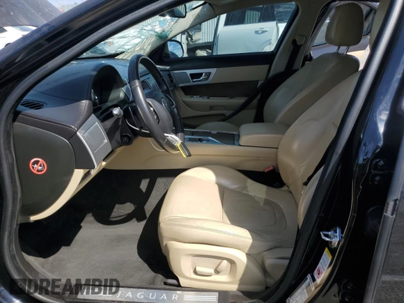 2013 Jaguar XF I4 RWD with VIN SAJWA0ES6DPS88882, listed as a Copart auction lot 70230634 with 84,496 mi miles and Salvage Title. Bid and sale history available at carsss.com. Image 7.
