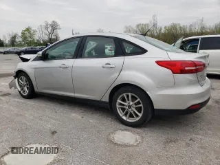 2017 Ford Focus SE with VIN 1FADP3F21HL267350, listed as a Copart auction lot 52897605 with 156,345 mi miles and Salvage title. Bid and sale history available at DreamBid. Image 2.