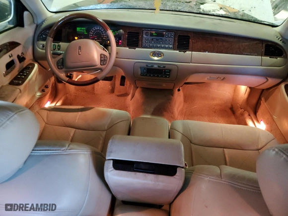 2002 Lincoln Town Car Cartier with VIN 1LNHM83W22Y662670, listed as a Copart auction lot 83526144 with 75,072 mi miles and Salvage Title. Bid and sale history available at carsss.com. Image 8.