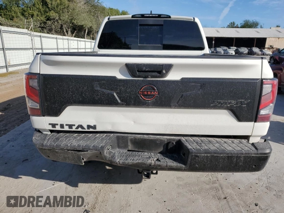 2023 Nissan Titan SV z VIN 1N6AA1ED7PN118575, wystawiony jako Copart lot #77127554 z przebiegiem 16 630 mil mil oraz Szkoda całkowita • Salvage title. Historia ofert i sprzedaży dostępna na DreamBid. Obrazek 6.