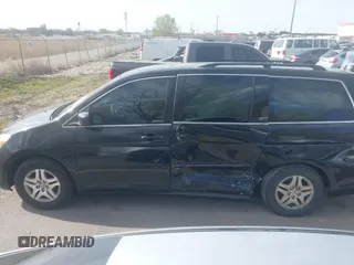 2007 Honda Odyssey EX-L with VIN 5FNRL38627B041332, listed as a IAAI auction lot 41934767 with 234,332 mi miles and . Bid and sale history available at carsss.com. Image 14.