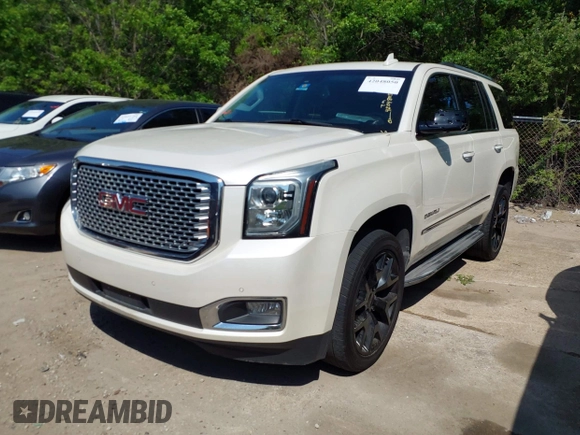 2015 GMC Yukon Denali with VIN 1GKS1CKJ8FR575730, listed as a IAAI auction lot 42048050 with 113,077 mi miles. Bid and sale history available at carsss.com. Image 18.