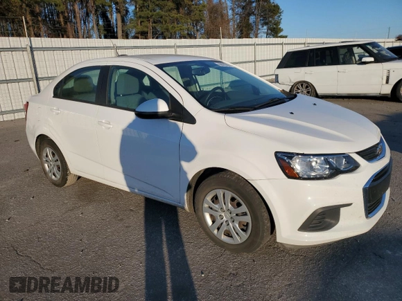 2018 Chevrolet Sonic LS with VIN 1G1JB5SH8J4121988, listed as a Copart auction lot 88000095 with 64,875 mi miles and Salvage title. Bid and sale history available at DreamBid. Image 4.