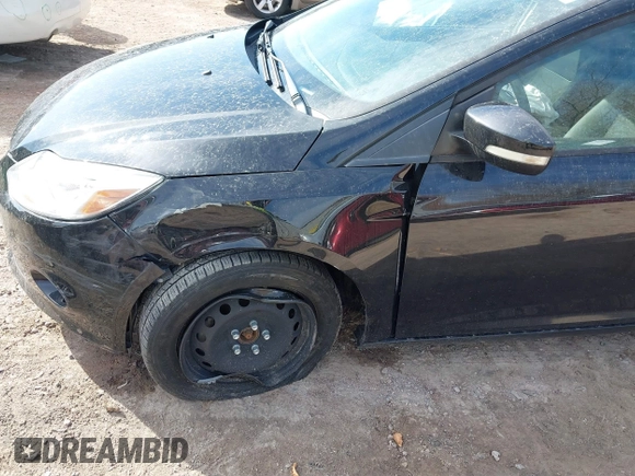2013 Ford Focus SE z VIN 1FADP3F28DL312357, wystawiony jako IAAI lot #41798311 z przebiegiem 98 280 mil mil oraz . Historia ofert i sprzedaży dostępna na DreamBid. Obrazek 6.