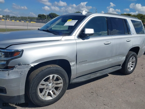 2017 Chevrolet Tahoe LT with VIN 1GNSCBKC6HR233401, listed as a IAAI auction lot 41544529 with 107,796 mi miles. Bid and sale history available at carsss.com. Image 6.