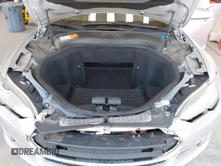 2013 Tesla Model S Performance with VIN 5YJSA1DP6DFP07999, listed as a IAAI auction lot 42284612 with 123,261 mi miles and . Bid and sale history available at DreamBid. Image 10.