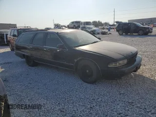 1996 Chevrolet Caprice with VIN 1G1BL82P2TR106404, listed as a Copart auction lot 74213214 with 156,588 mi miles and Salvage title. Bid and sale history available at DreamBid. Image 4.