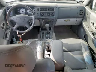 2002 Mitsubishi Montero z VIN JA4LS31R92J030918, wystawiony jako Copart lot #55696565 z przebiegiem 153 814 mil mil oraz Tytuł czysty. Historia ofert i sprzedaży dostępna na DreamBid. Obrazek 8.