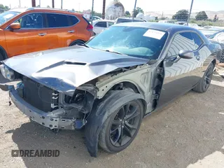 2017 Dodge Challenger R/T Plus with VIN 2C3CDZBT8HH600032, listed as a IAAI auction lot 42173591 with 92,303 mi miles and . Bid and sale history available at DreamBid. Image 2.