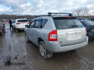 2010 Jeep Compass Sport with VIN 1J4NF4FB3AD589361, listed as a IAAI auction lot 41449412 with 127,807 mi miles. Bid and sale history available at carsss.com. Image 3.