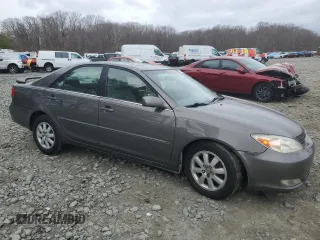 2004 Toyota Camry LE with VIN 4T1BE30K14U918475, listed as a Copart auction lot 47646465 with 258,973 mi miles and Salvage Title. Bid and sale history available at DreamBid. Image 4.