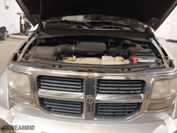 2007 Dodge Nitro SLT with VIN 1D8GU58K97W616455, listed as a IAAI auction lot 41229813 with 199,421 mi miles. Bid and sale history available at carsss.com. Image 10.