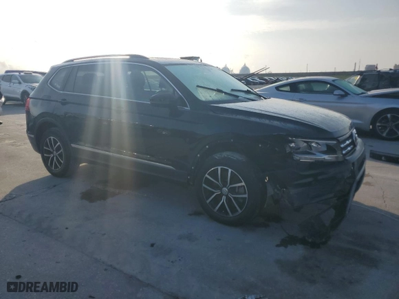 2021 Volkswagen Tiguan SE with VIN 3VV3B7AXXMM085722, listed as a Copart auction lot 54438285 with 76,746 mi miles and Clean Title. Bid and sale history available at carsss.com. Image 4.