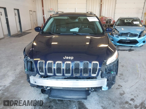 2014 Jeep Cherokee Latitude z VIN 1C4PJMCS2EW219949, wystawiony jako IAAI lot #42221418 z przebiegiem 74 961 mil mil oraz . Historia ofert i sprzedaży dostępna na DreamBid. Obrazek 6.