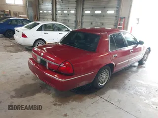 2001 Mercury Grand Marquis GS z VIN 2MEFM74W01X636957, wystawiony jako IAAI lot #42270858 z przebiegiem 181 372 mil mil oraz . Historia ofert i sprzedaży dostępna na DreamBid. Obrazek 4.