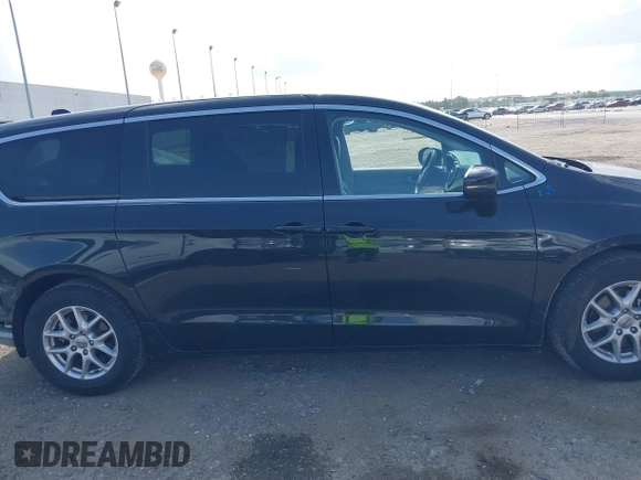 2023 Chrysler Pacifica Touring L z VIN 2C4RC1BG6PR628076, wystawiony jako IAAI lot #42553624 z przebiegiem 59 442 mil mil oraz . Historia ofert i sprzedaży dostępna na DreamBid. Obrazek 14.
