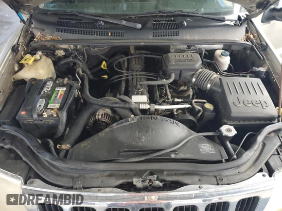 2003 Jeep Grand Cherokee Laredo with VIN 1J4GW48S43C567559, listed as a Copart auction lot 61431595 with 249,998 mi miles and Salvage title. Bid and sale history available at DreamBid. Image 12.