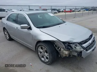 2012 Ford Fusion SE z VIN 3FAHP0HA8CR218709, wystawiony jako IAAI lot #41606596 z przebiegiem 170 518 mil mil oraz . Historia ofert i sprzedaży dostępna na DreamBid. Obrazek 1.