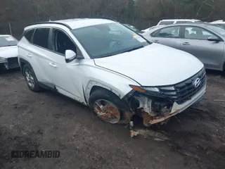 2022 Hyundai Tucson SEL z VIN 5NMJB3AE2NH141296, wystawiony jako IAAI lot #41534492 z przebiegiem 76 383 mil mil oraz . Historia ofert i sprzedaży dostępna na DreamBid. Obrazek 1.