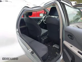 2010 Toyota Yaris with VIN JTDKT4K38A5296999, listed as a IAAI auction lot 41878127 with 122,692 mi miles. Bid and sale history available at carsss.com. Image 8.